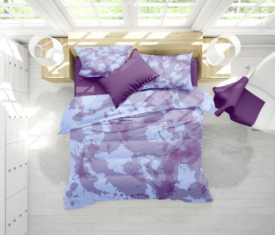 blue bedding with paint splats
